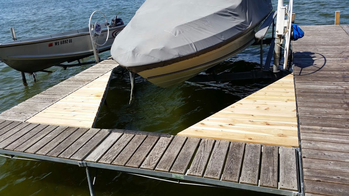 Custom triangle pier with boat lift